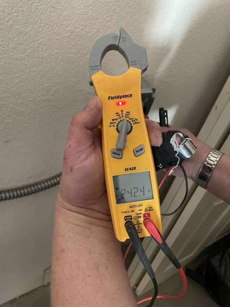 Voltage testing with clamp meter during Hot Tub / Pool Electrical Wiring in Litchfield